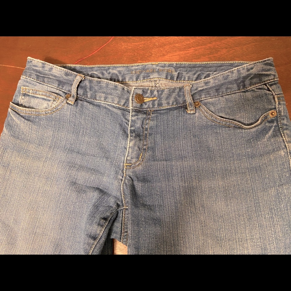 MK light wash jeans 6